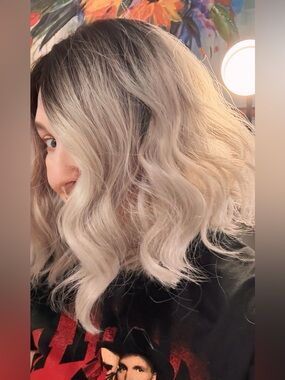 Med length swinging wavy ombré bob blonde with dark roots